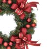Ozdobený zelený adventný veniec s červenými a zlatými dekoráciami a červeno-zlatými mašľami.