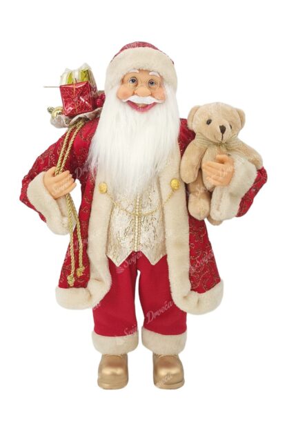 Dekoracija Santa Claus crveno-zlatni 60cm, ima crveni kaputić sa bijelim krznom, u jednoj ruci nosi igračku mjedvedića a u drugoj vrećicu sa poklonima